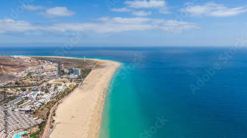 Morro Jable Canary Island, Fuerteventura Spain, Aerial view on coast of atlantic ocean and beach, Drone shot of sea  © Maciej