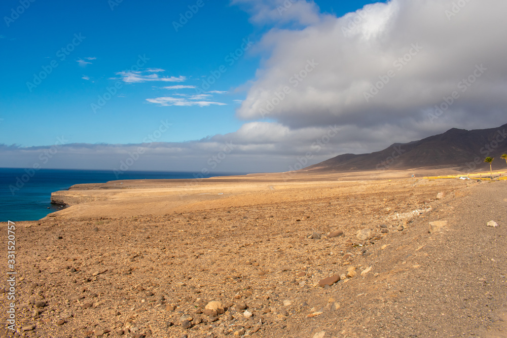 Fuerteventura, Spain Beautiful landscape on Coast of Atlantic Ocean in sunny day Fuerteventura, Spain Beautiful landscape on Coast of Atlantic Ocean in sunny day