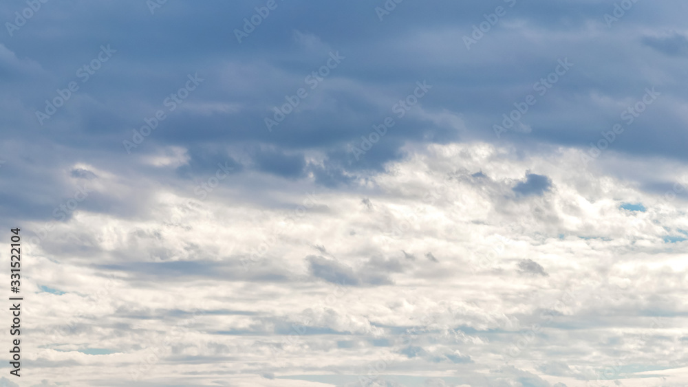 Sky with dark and light clouds, background for design_
