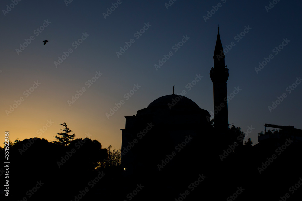 The small mosque,Firuzaga of Istanbul in dark at sunset.Ramadan concept.