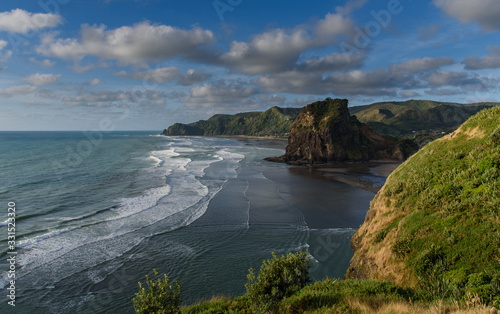Coastal view over black sand beach, Piha, New Zealand