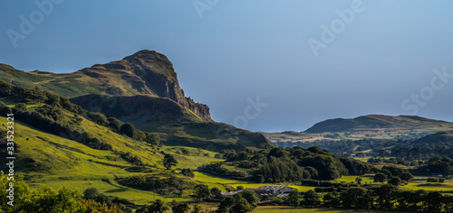 Bird's Rock, Craig Yr Aderyn, and surrounding farmland on a bright summers day, Wales.