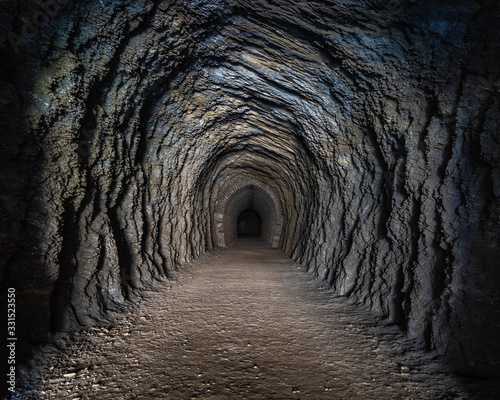 Path through an abandoned railway tunnel, Otago, New Zealand