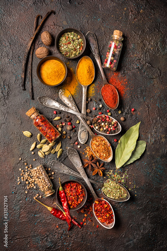 Fototapeta Naklejka Na Ścianę i Meble -  Different spices, dry kitchen herbs and seeds for tasty meals