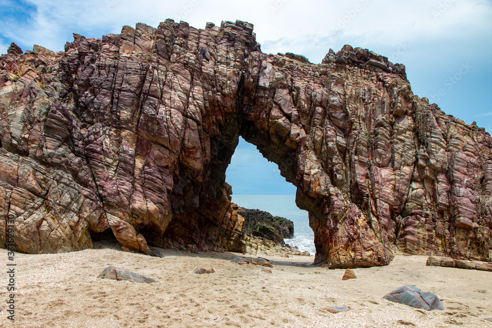 Pedra Furada (Holed Stone) at Jericoacoara beach - Ceara, Brazil, on a tour from Jeriquaquara