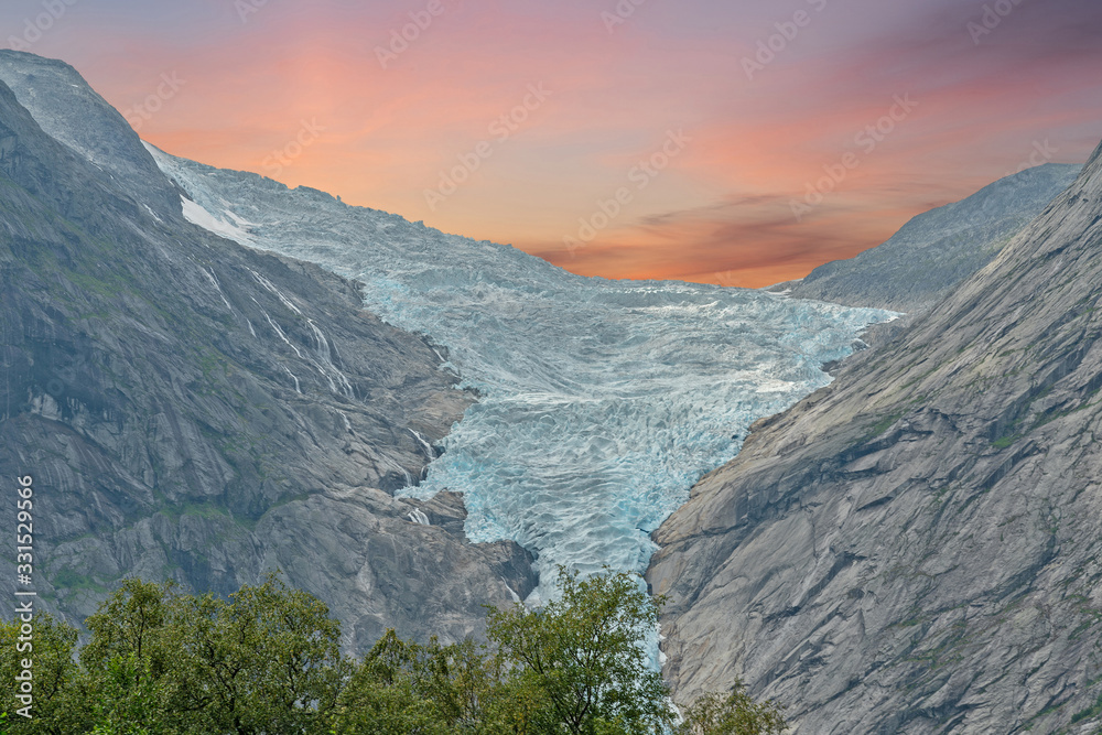 Obraz premium Glacier in National park Jostedalsbreen, mountain sunset landscape view, Norway