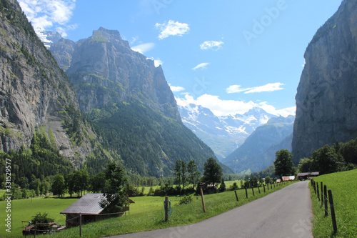 The stunning mountain view from the road through the Lauterbrunnen Valley in the Bernese Oberland in Switzerland. Summer tourism