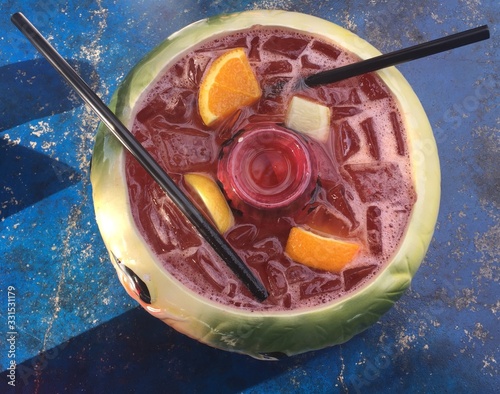 TTop View of Refreshing fruit - flavored cocktail on a warm summer day photo