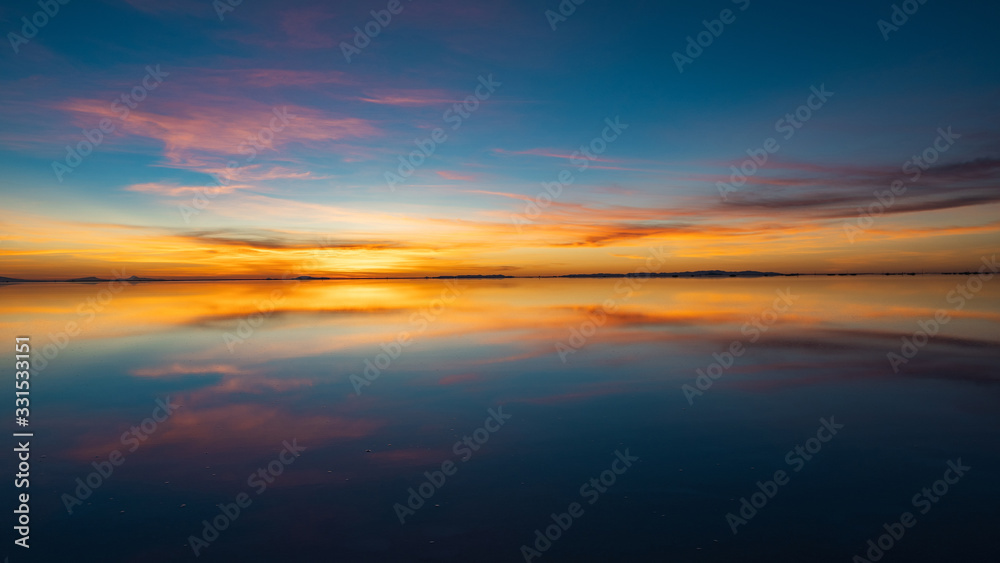 Sunrise Over Uyuni Salt Flats (Spanish: Salar de Uyuni ) in Bolivia, South America.