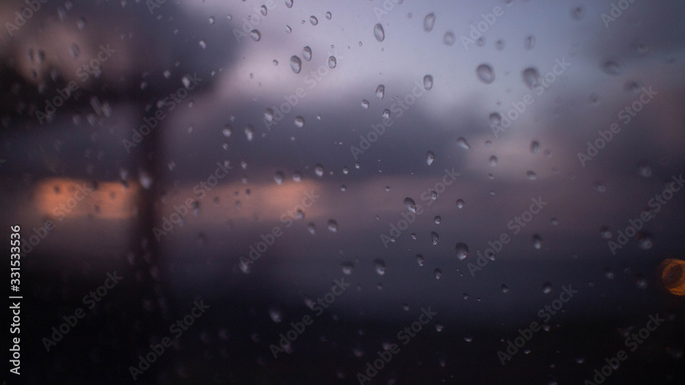 Rain Drops on window at Dusk