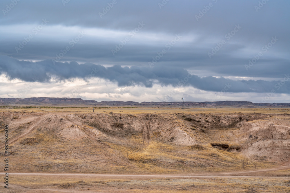 dark stormy clouds over prairie