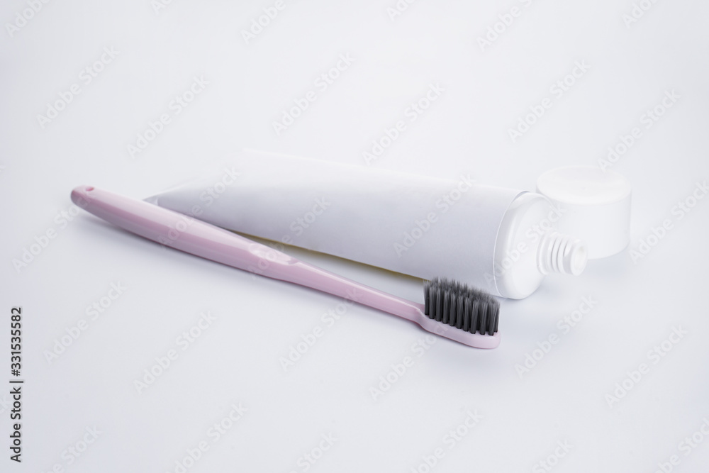 Toothbrush and toothpaste on a white background Toothbrush and toothpaste on a white background