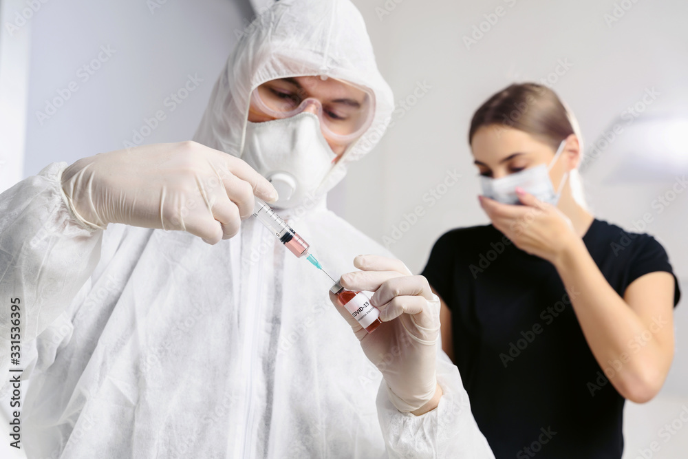 Pandemic covid-19. A virologist doctor holding a coronavirus vaccine. An infected girl coughs in the background.