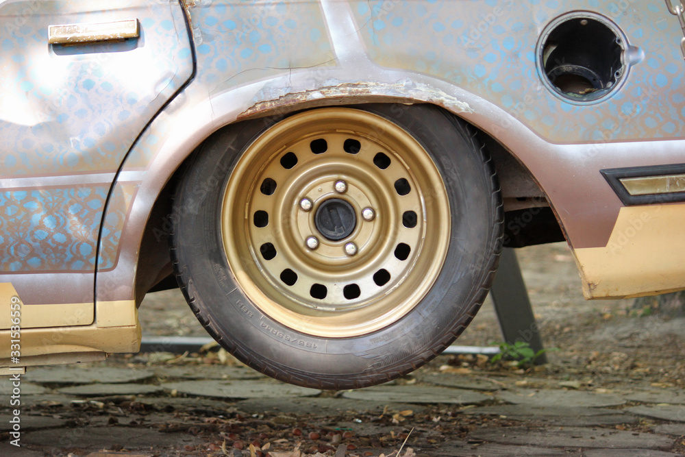 Wheel of old rusty car