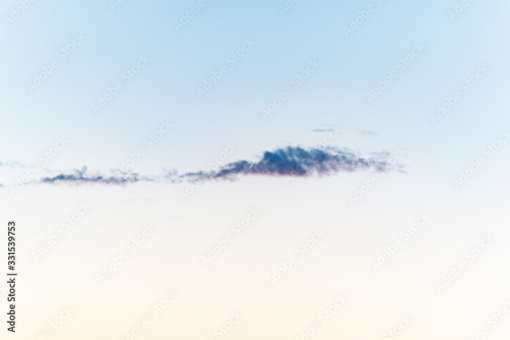 Fototapeta premium Frowning clouds in the evening sky