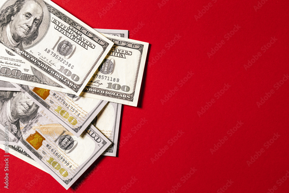 money isolated on red background money isolated on red background