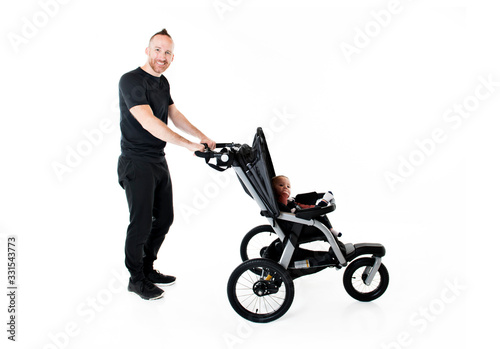 A father jogging with a baby stroller