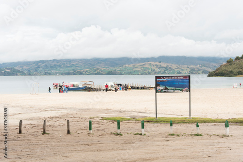 Informational sign on the shore of Tota, the largest lake in Colombia