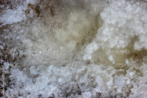White marine salt from Mediterranean sea, natural minerals. Top view. Free copy space. Background.