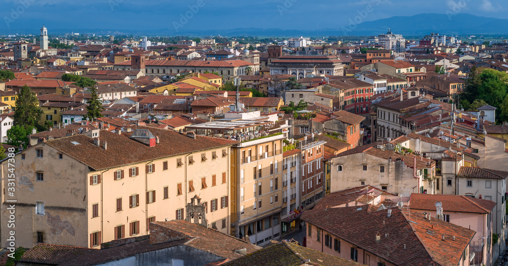 Pisa old town panorama at soft sunset light. Landmarks of Tuscany, Italy.