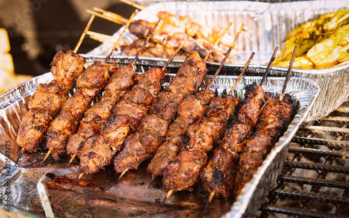 Pork skewer kebab in street food market