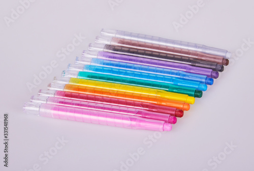 New twistable colorful pencils for coloring on a white background © Liudmila