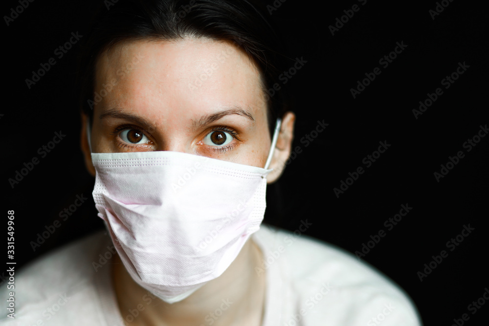 woman wearing medical mask close up woman wearing medical mask close up
