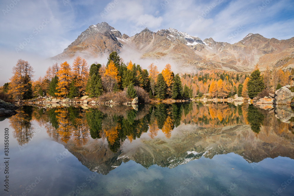  Val Viola lake during autumn, Val di Campo, Poschiavo valley, Graubünden, Switzerland