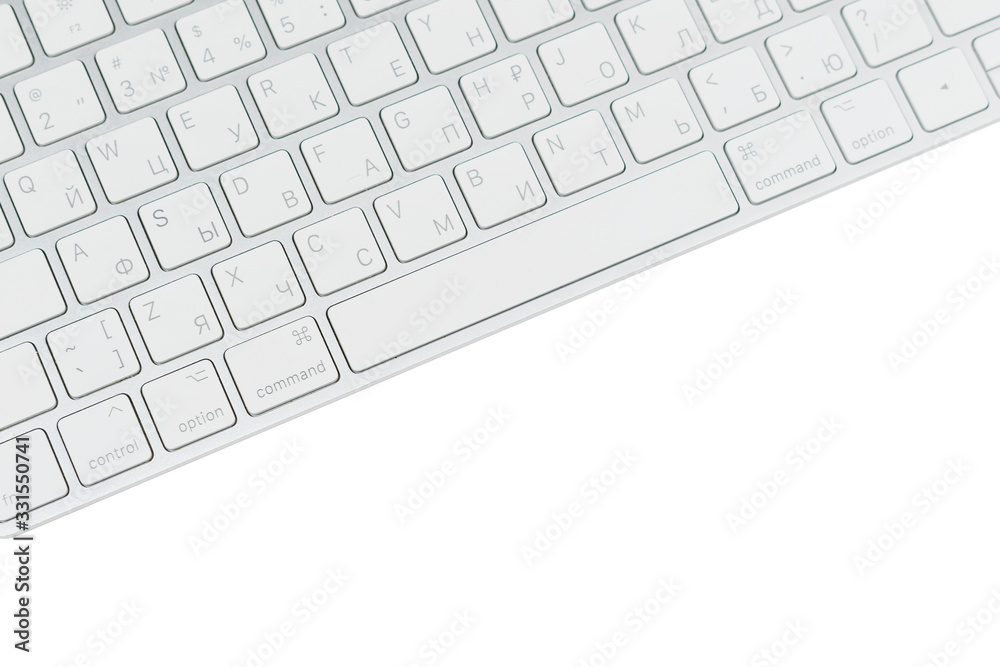 White keyboard from a computer on a white background close-up White keyboard from a computer on a white background close-up