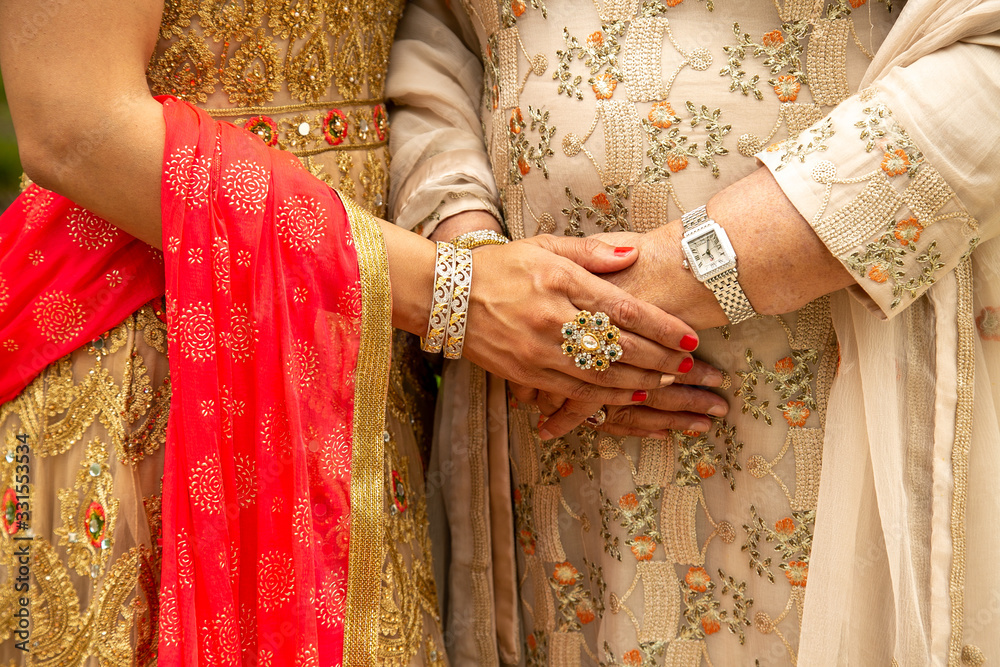hands of woman in traditional dress