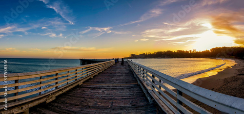 Panorama of Pier  Perspective at Sunset at Beach