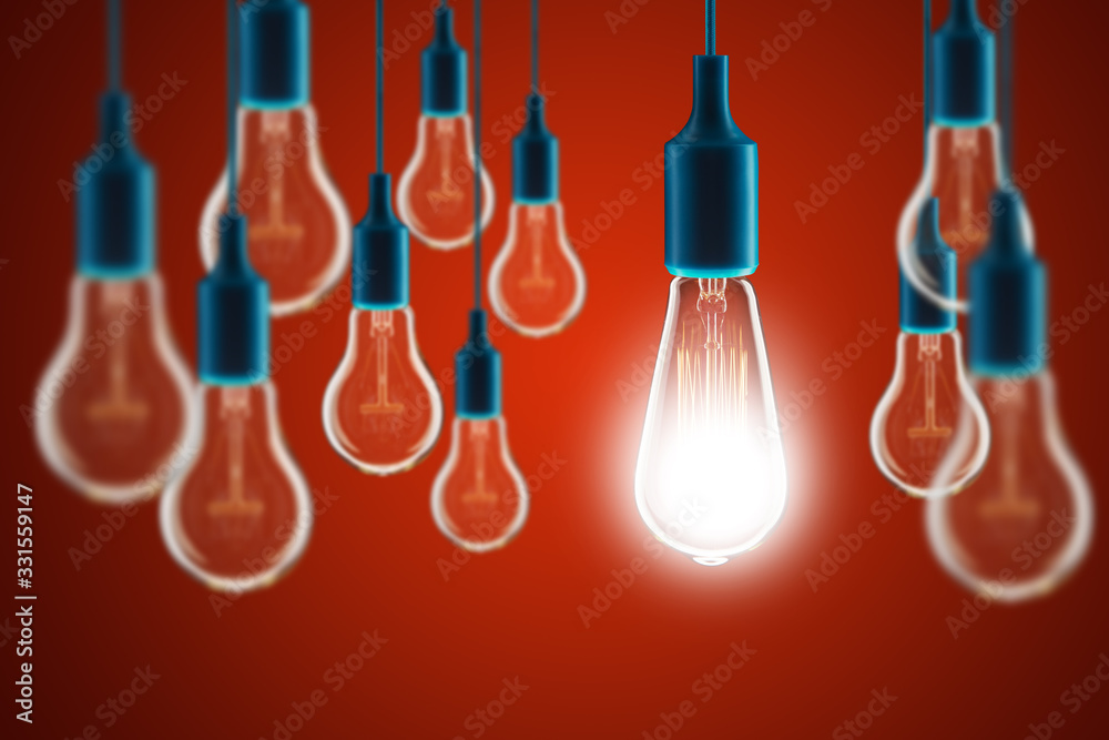 Idea and leadership concept - bulbs on the red background Idea and leadership concept - bulbs on the red background