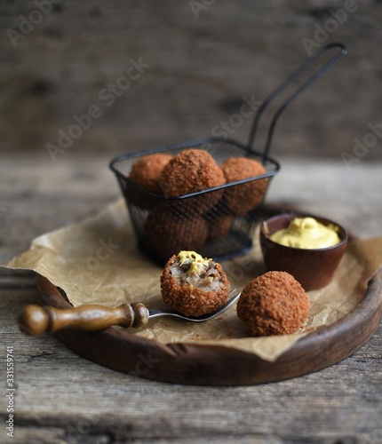 Bitterballen with mustard, warm fried snack, served in the Netherlands