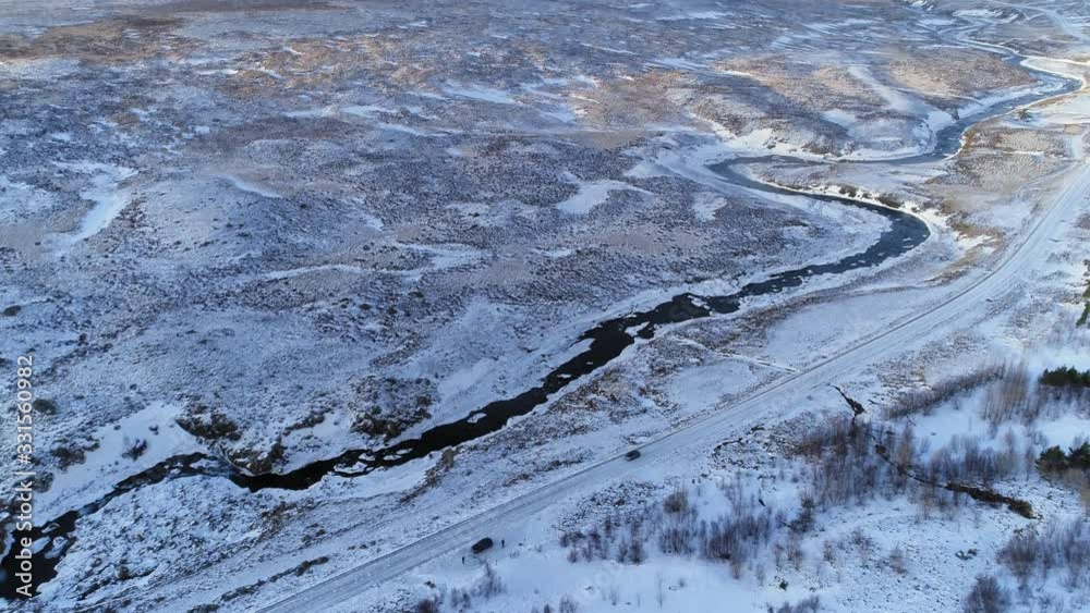 The peaceful white snow covered landscape of Iceland - aerial The peaceful white snow covered landscape of Iceland - aerial