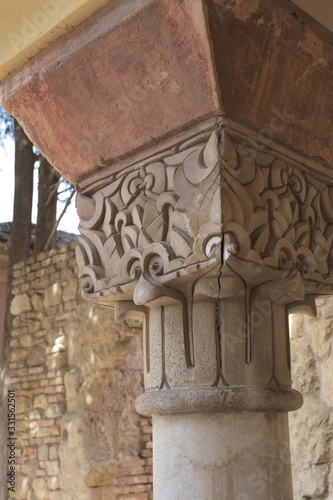 Chapiter column in ancient muslim palace of Alcazaba, Malaga, Spain photo