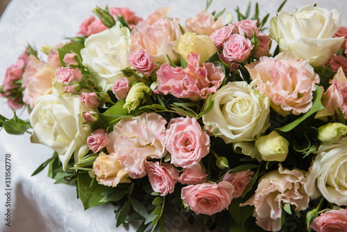 Colorful wedding bouquet on a table. Bridal bouquet. Luxury royal hotel. Valentine's day, birthday, dating or mother's day decoration