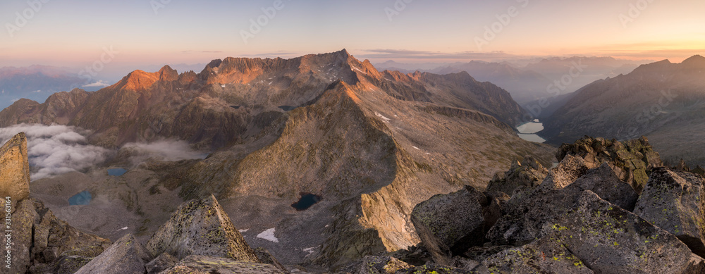 Panoramic view of Baitone peaks at sunrise in Valle Camonica, Adamello Park, Italy