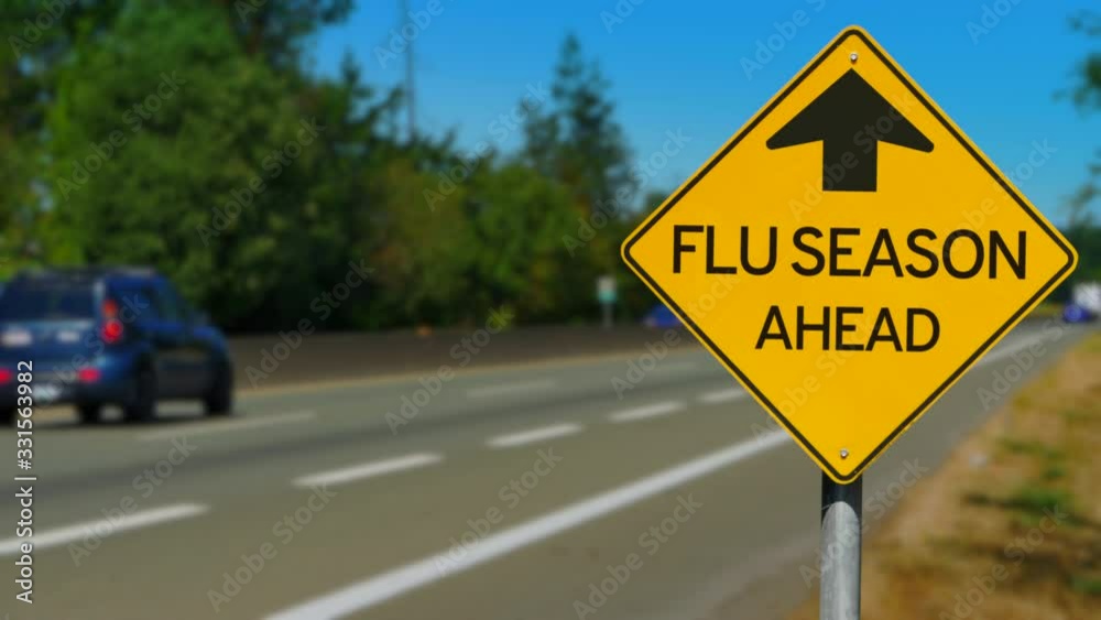 Flu Season Ahead, Yellow Road Sign, Seamless Looping Video Flu Season Ahead, Yellow Road Sign, Seamless Looping Video