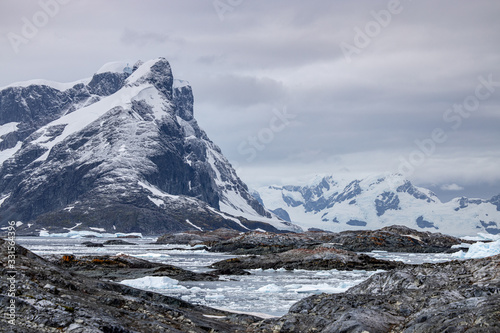 snow covered mountains in winter landscape in antarctica 