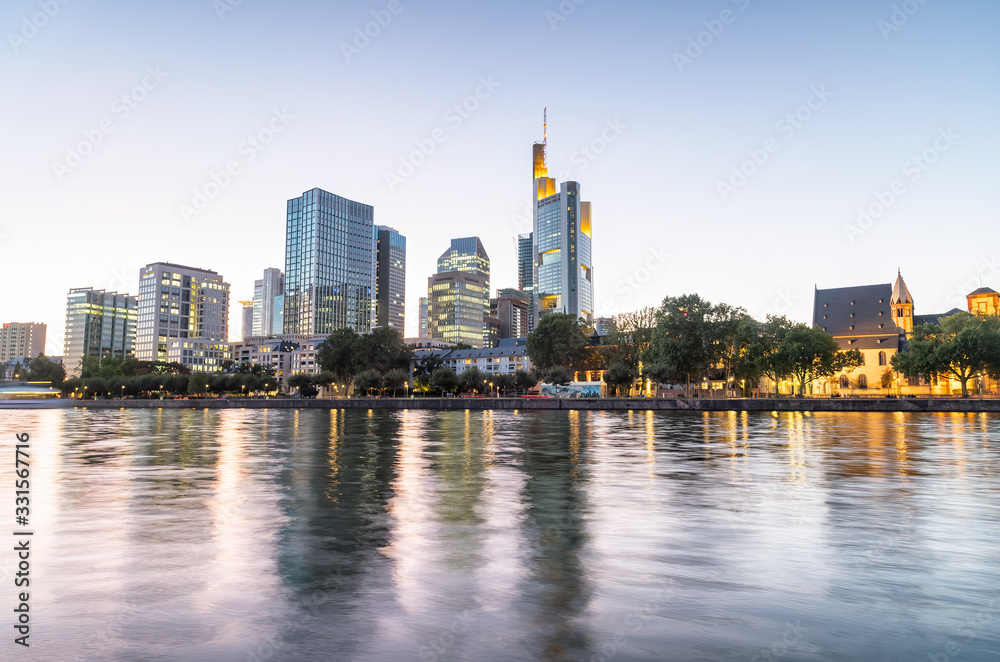 Modern skyline of Frankfurt, Germany. City river and buildings at night