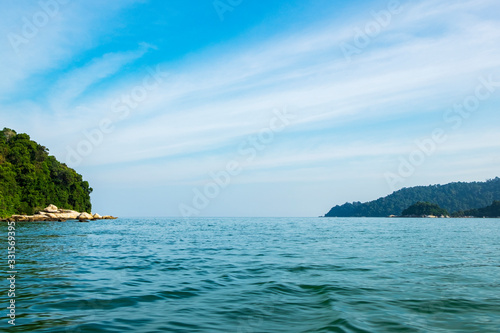 tourist enjoy the beauty of nature surrounding Pangkor Island located in Perak State, Malaysia during island hoping activity