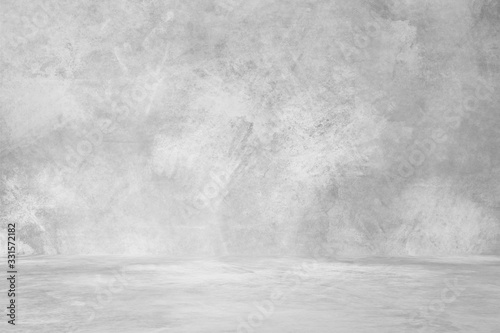 Fototapeta Empty room with white wall and concrete floor 