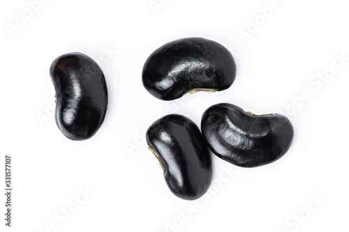 Black beans ( Urad dal, black gram or vigna mungo ) isolated on white background . Top view.