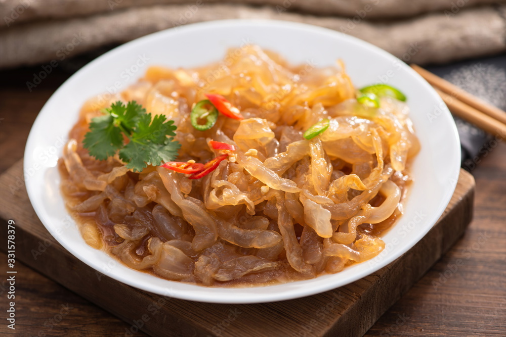 Pickled with jellyfish, the spicy pickle tastes crispy. It's a delicacy in Asia and the East. It's very popular in Korea and Japan Pickled with jellyfish, the spicy pickle tastes crispy. It's a delicacy in Asia and the East. It's very popular in Korea and Japan