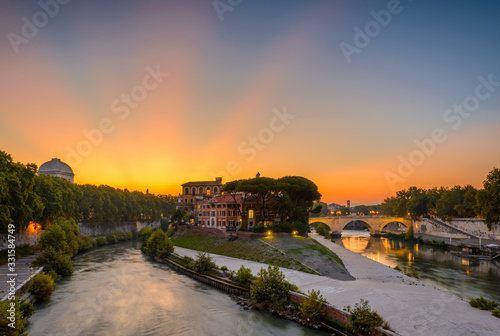Fate Bene Fratelli Hospital. Sunrise at the historical Tiber river from the Garibaldi bridge, Rome, Italy.  Sep 25/2017 