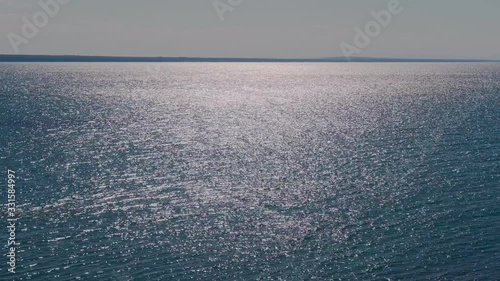 Beautiful glare of the sun on the surface of the sea