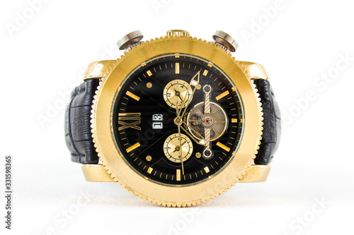 Gold wrist watch on a white background