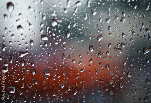 Close-up view of the rain drops on the glass