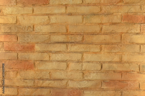 Texture or background light brown brick wall.