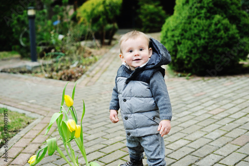 Baby boy with tulips